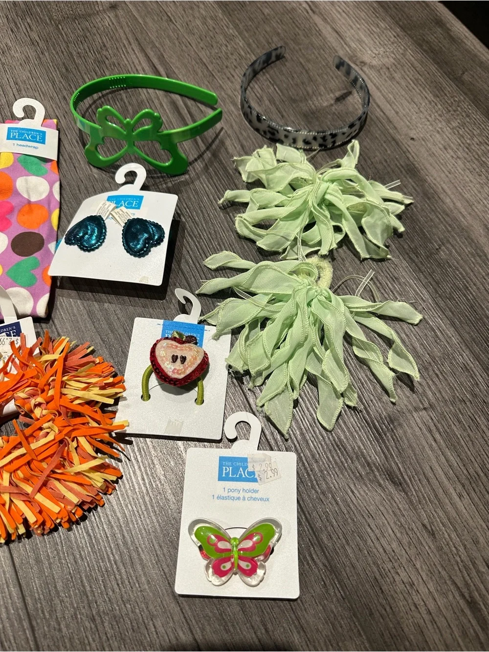 The Children's Place Orange Pom-Pom Hair Tie with Mixed Green and Black Accents